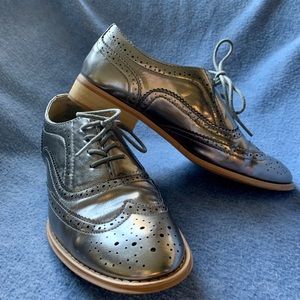 Shiny Silver Wingtip Shoes With Wooden Heels